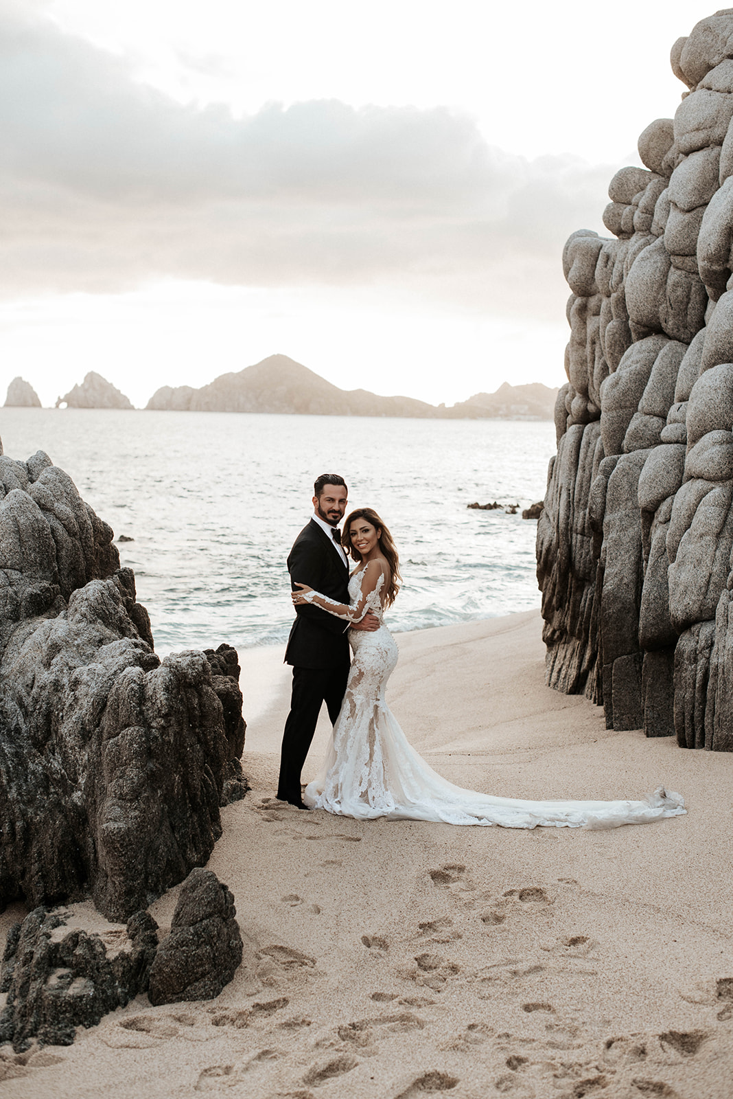 Los Cabos Ocean Backdrop featuring Bride and Groom